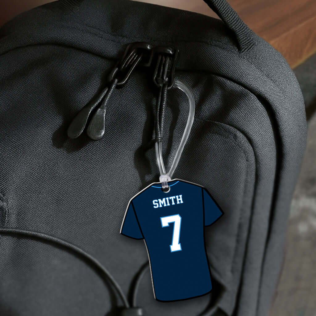 Personalized metal baseball / softball jersey hang tag ornament. 3.5″, includes name and number