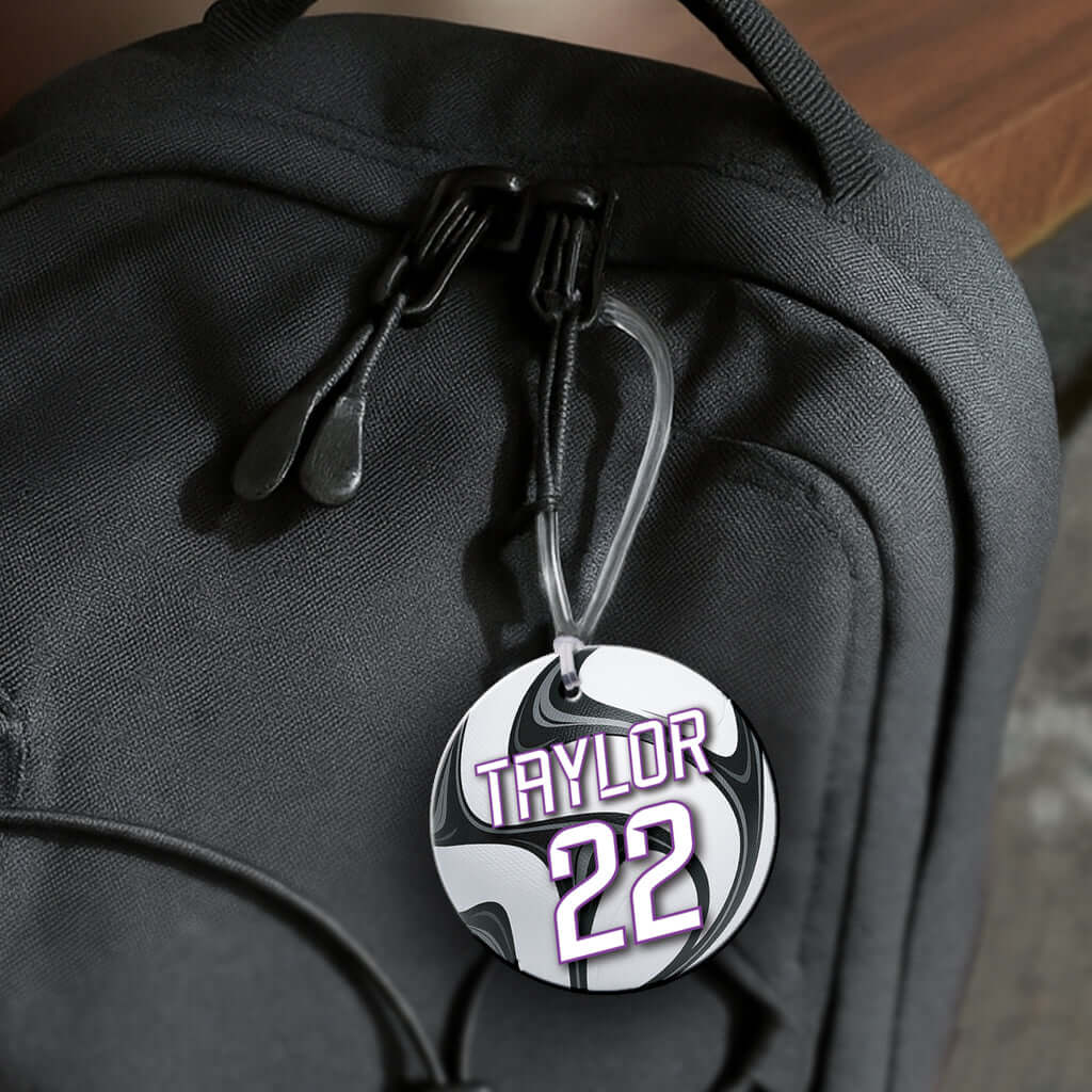 Personalized metal soccer ball hang tag ornament. 3.5″, includes name and number