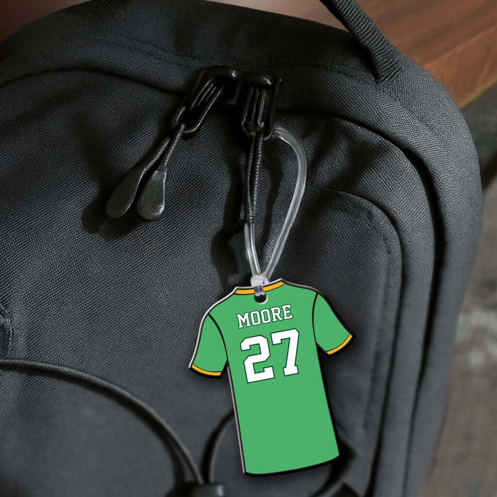 Personalized metal volleyball jersey hang tag ornament. 3.5″, includes name and number