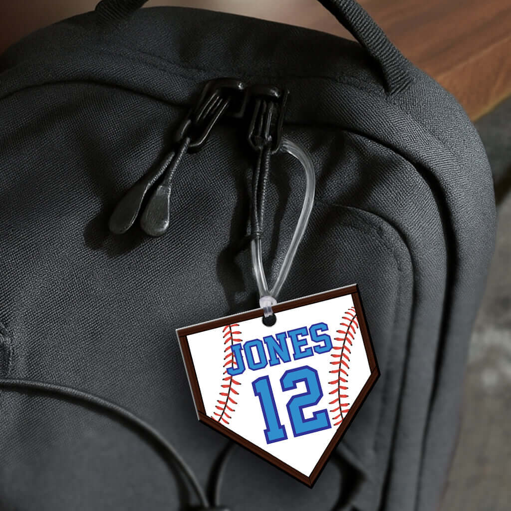 Personalized metal home plate hang tag ornament for baseball. 3.5″, includes name and number