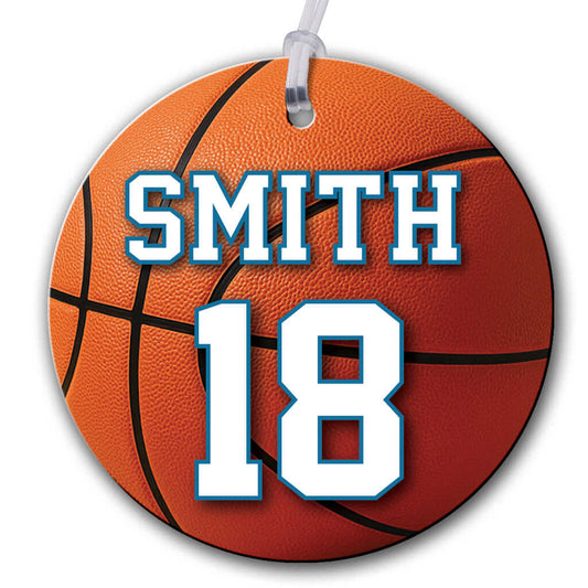 Personalized metal basketball hang tag ornament. 3.5″, includes name and number