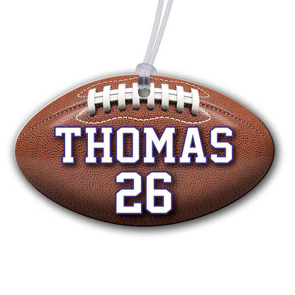 Personalized metal football hang tag ornament. 3.5″, includes name and number